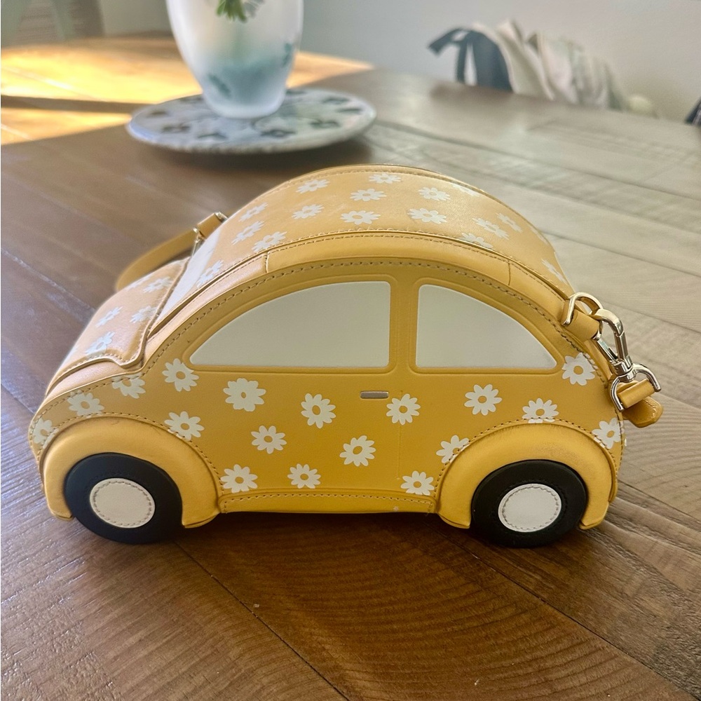 Kate Spade Yellow Car-Shaped Handbag with Floral Design